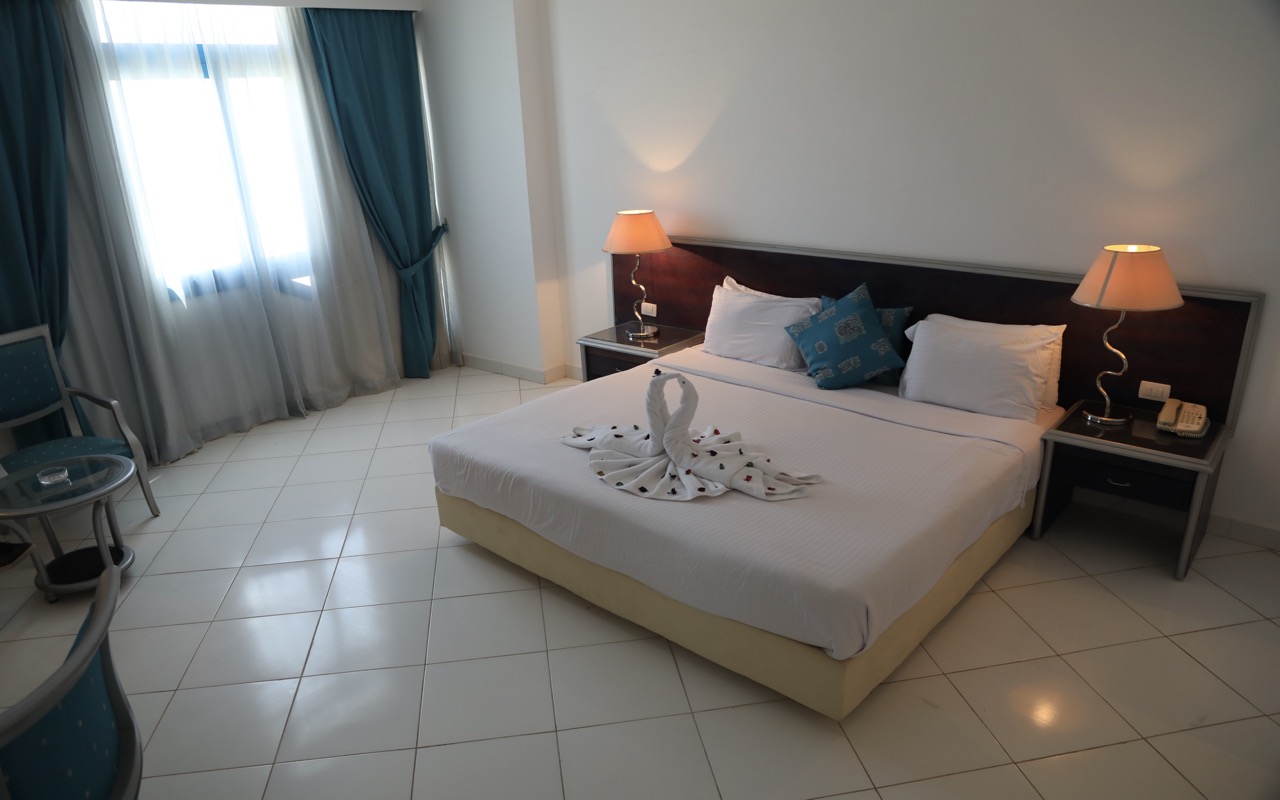 Junior Suite Pool/Sea Side View 1