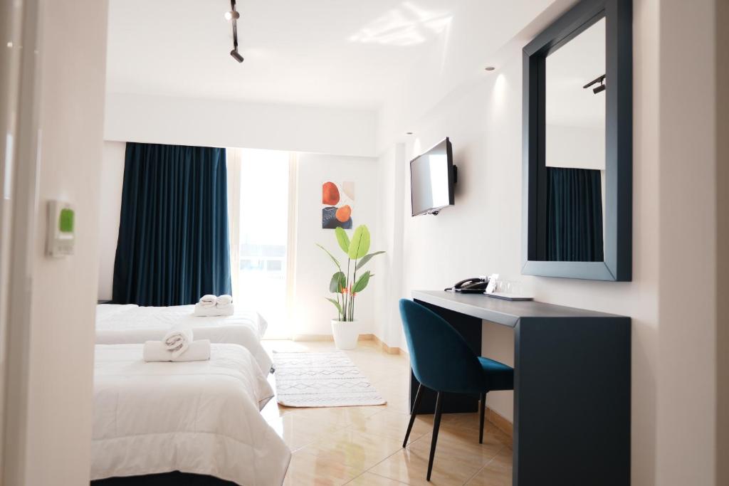 Superior Triple Room With Balcony Sea View 1